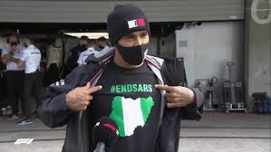 F1 legend Hamilton dons #EndSARS T-shirt for pre-race interview - Daily  Nigerian